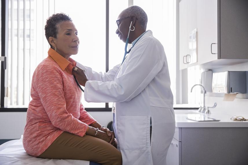 Senior female being examined by female doctor