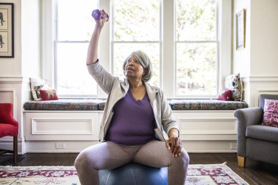 Older woman lifting weights